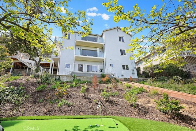 334 Anita Dr, Pasadena, CA 91105 - rear view of house featuring a putting area and stucco siding