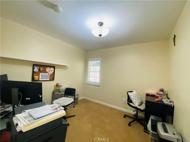 office with baseboards and carpet floors