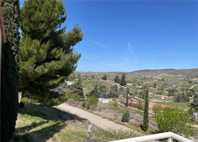 surrounding community featuring a mountain view