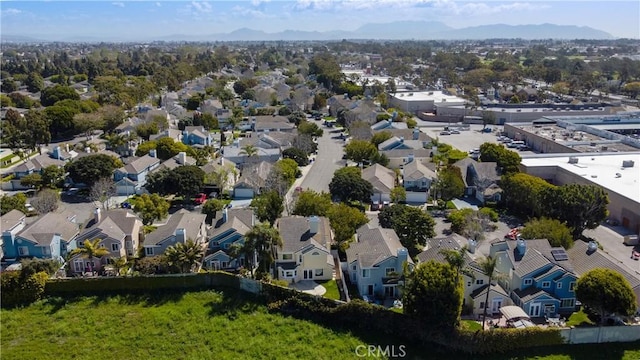 aerial view with a mountain view and a residential view