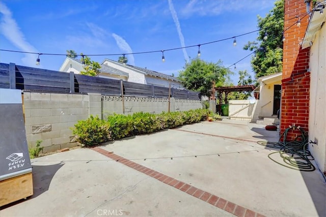 view of patio featuring a fenced backyard