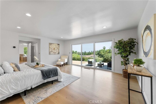 950 S Spring Meadow Dr, West Covina, CA 91791 - bedroom featuring access to outside, multiple windows, wood finished floors, recessed lighting, and baseboards