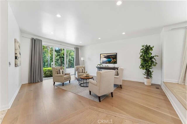950 S Spring Meadow Dr, West Covina, CA 91791 - living area with light wood-style floors, recessed lighting, and baseboards