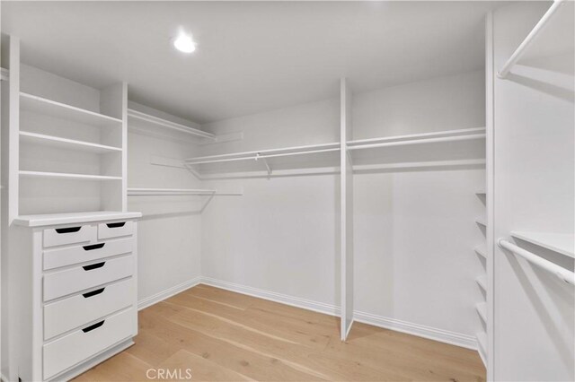950 S Spring Meadow Dr, West Covina, CA 91791 - walk in closet with light wood-type flooring