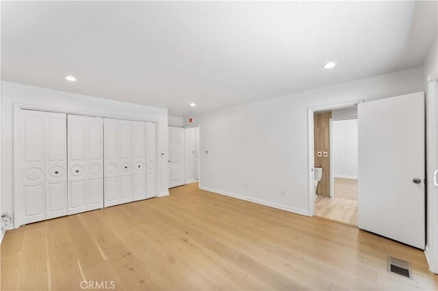 950 S Spring Meadow Dr, West Covina, CA 91791 - unfurnished bedroom with light wood-type flooring, recessed lighting, and baseboards