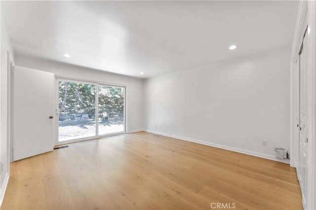 950 S Spring Meadow Dr, West Covina, CA 91791 - unfurnished room with light wood-style flooring, recessed lighting, and baseboards