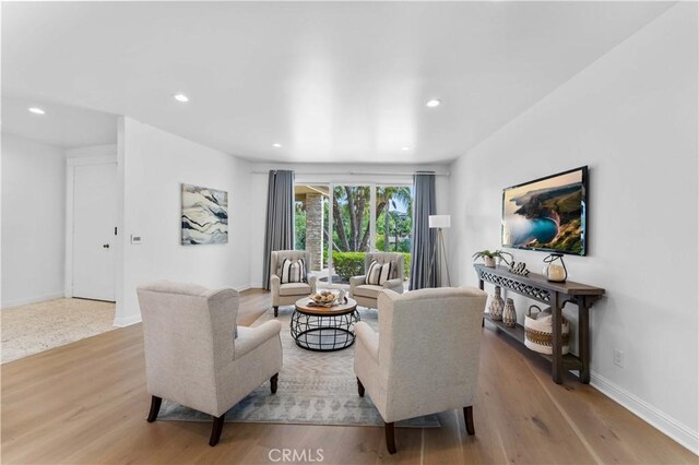 950 S Spring Meadow Dr, West Covina, CA 91791 - living area with recessed lighting, wood finished floors, and baseboards