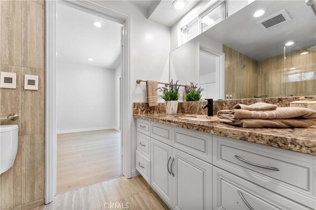 950 S Spring Meadow Dr, West Covina, CA 91791 - bathroom featuring vanity, toilet, a shower, recessed lighting, and baseboards