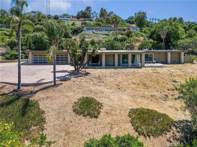 950 S Spring Meadow Dr, West Covina, CA 91791 - rear view of property featuring a detached garage