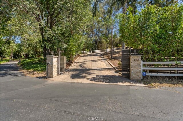 950 S Spring Meadow Dr, West Covina, CA 91791 - gate with view of scattered trees