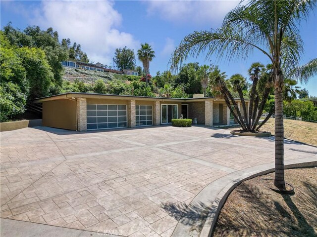 950 S Spring Meadow Dr, West Covina, CA 91791 - view of front of property featuring an attached garage and driveway