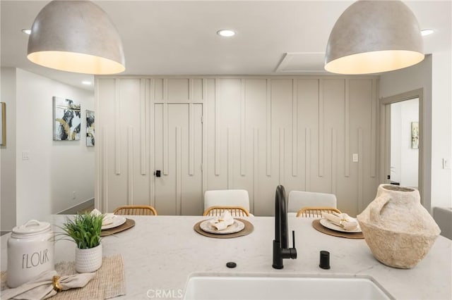 dining room with recessed lighting