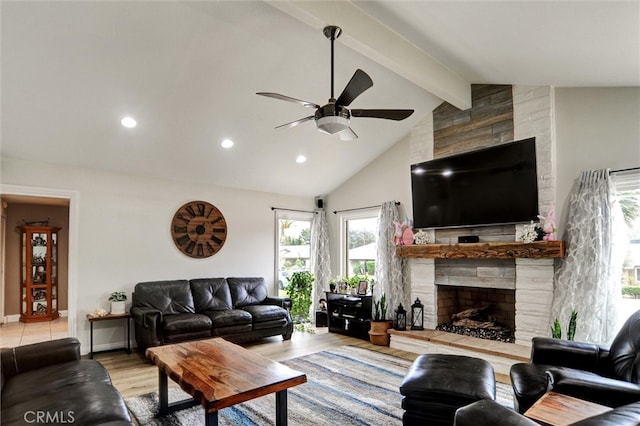 living area with a ceiling fan, wood finished floors, vaulted ceiling with beams, a fireplace, and recessed lighting
