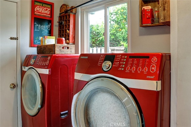 laundry room with washer and dryer and laundry area