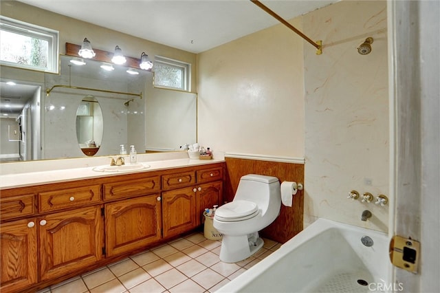bathroom with bathtub / shower combination, tile patterned floors, vanity, and toilet