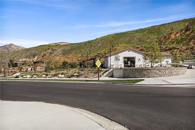 exterior space with a mountain view