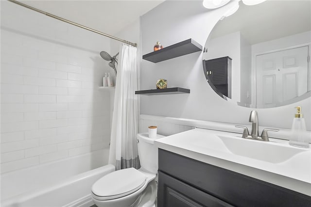 bathroom featuring toilet, vanity, and shower / bathtub combination with curtain