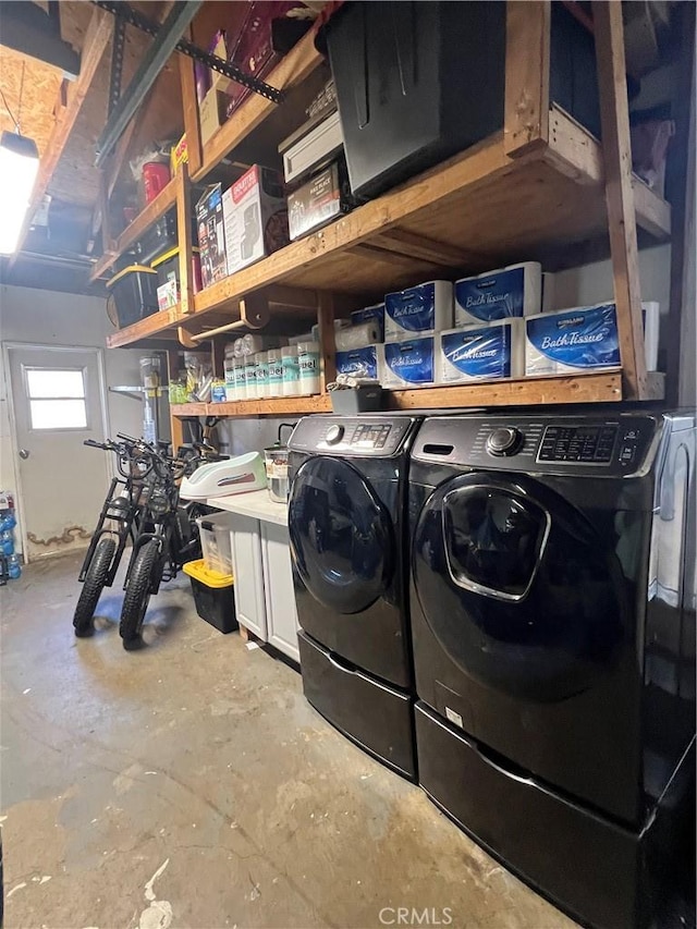 laundry area featuring independent washer and dryer and laundry area