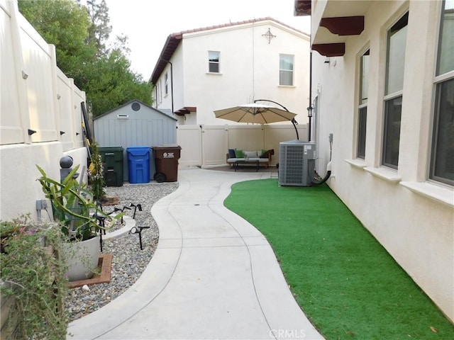 772 Francesca Dr, Walnut, CA 91789 - fenced backyard with central AC unit, an outdoor hangout area, and a patio