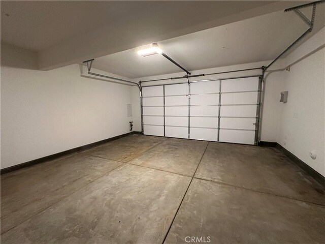 4450 S Bryant Paseo, Ontario, CA 91762 - garage featuring baseboards