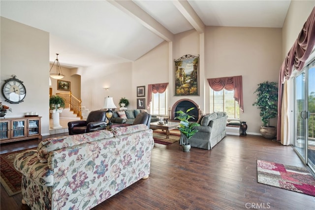 living room featuring high vaulted ceiling, beamed ceiling, stairway, baseboards, and dark wood-style floors