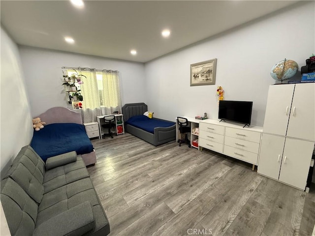 14615 Wyandotte St, Van Nuys, CA 91405 - living room featuring wood finished floors and recessed lighting