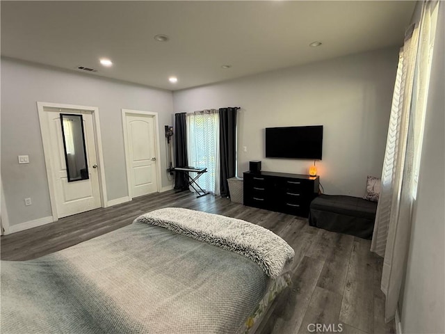 14615 Wyandotte St, Van Nuys, CA 91405 - bedroom with visible vents, baseboards, recessed lighting, and dark wood finished floors