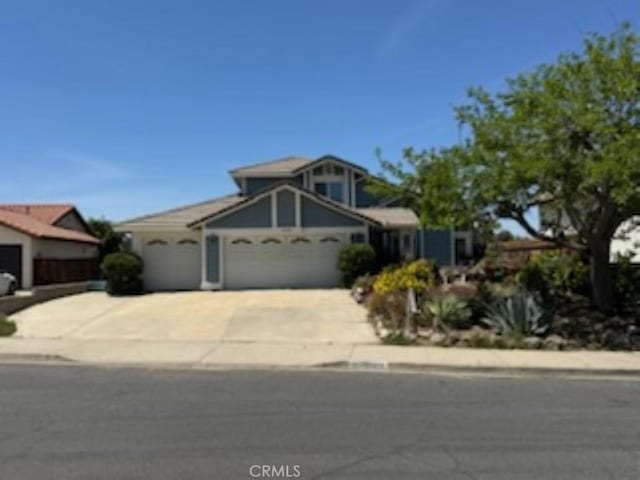 25499 Marvin Gardens Way, Murrieta, CA 92563 - traditional-style house featuring driveway and an attached garage
