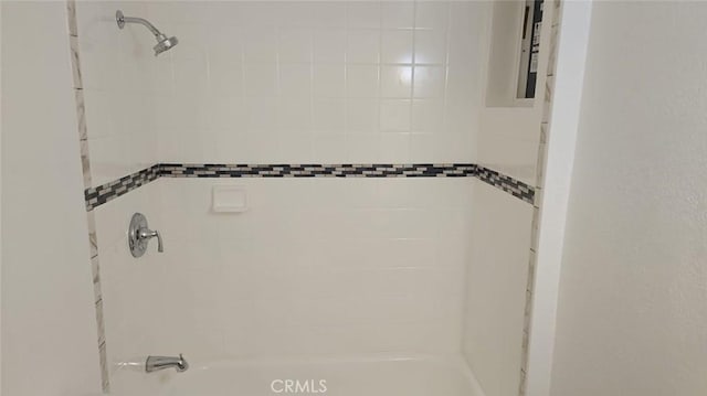 bathroom featuring shower / tub combination