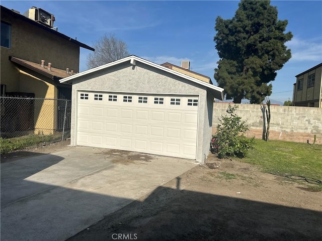 detached garage with fence