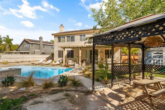 view of pool featuring a fenced in pool, a patio, and a fenced backyard