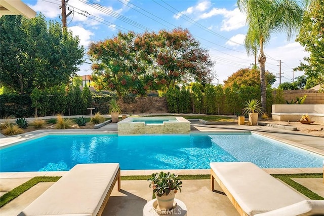 view of swimming pool featuring a patio, a fenced backyard, a fenced in pool, and an in ground hot tub
