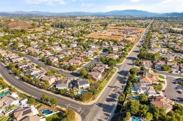 bird's eye view featuring a mountain view and a residential view