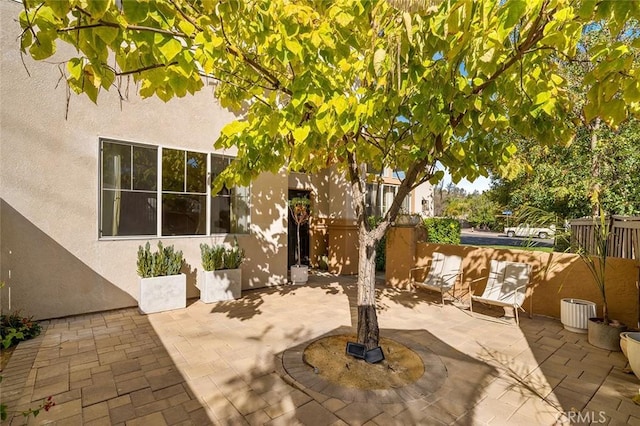 view of patio / terrace with fence