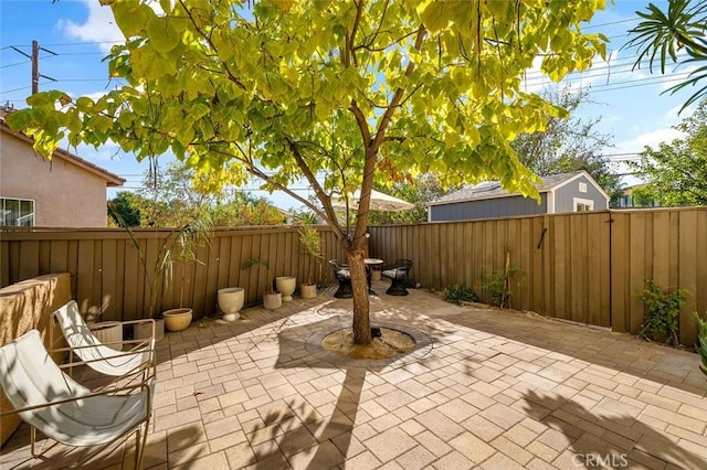 view of patio with a fenced backyard