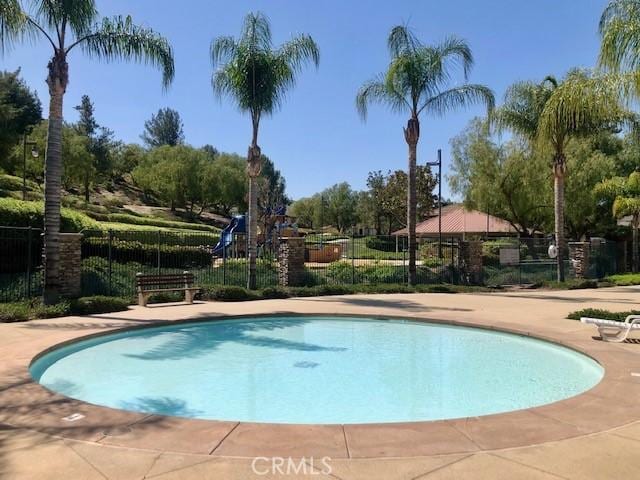 10969 Elkwood Cir, Riverside, CA 92503 - view of swimming pool with fence