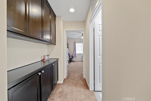10969 Elkwood Cir, Riverside, CA 92503 - corridor featuring light carpet and baseboards