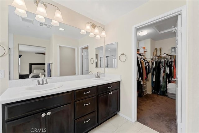 10969 Elkwood Cir, Riverside, CA 92503 - ensuite bathroom with double vanity and a spacious closet