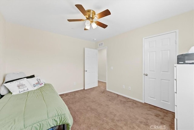 10969 Elkwood Cir, Riverside, CA 92503 - carpeted bedroom featuring baseboards and a ceiling fan