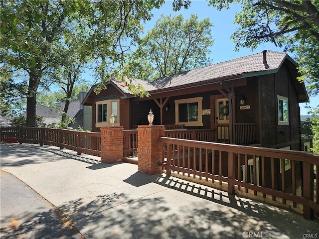 28662 Zion Dr, Lake Arrowhead, CA 92352 - ranch-style home with covered porch