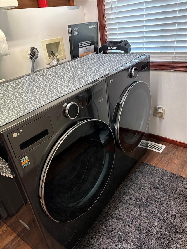 28662 Zion Dr, Lake Arrowhead, CA 92352 - washroom featuring washer and clothes dryer and wood finished floors