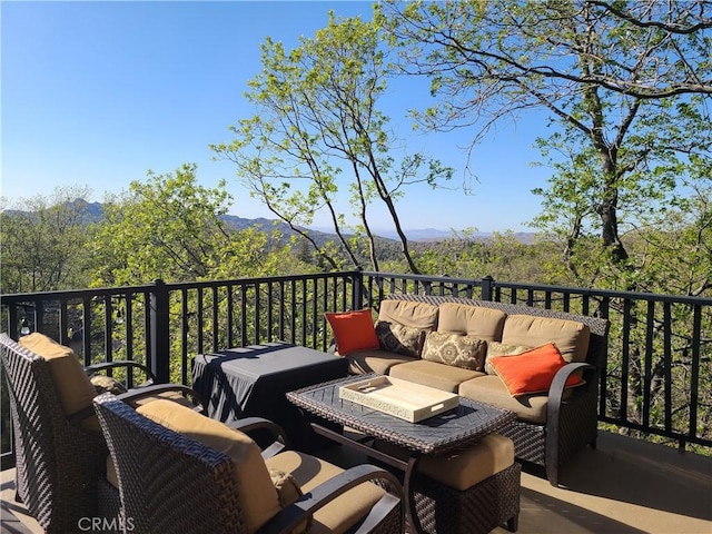 28662 Zion Dr, Lake Arrowhead, CA 92352 - wooden deck with an outdoor living space