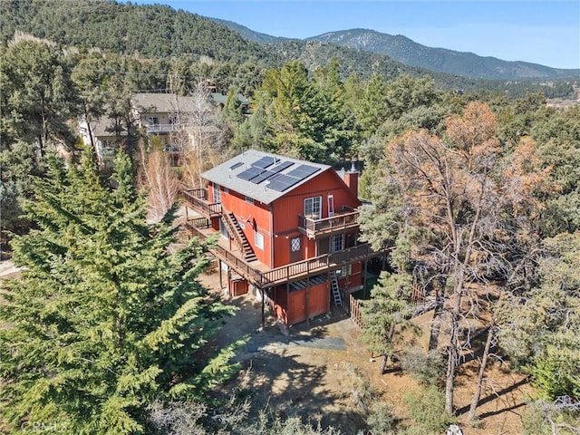14521 Voltaire Dr, Pine Mountain Club, CA 93222 - view from above of property with a heavily wooded area and a mountain backdrop