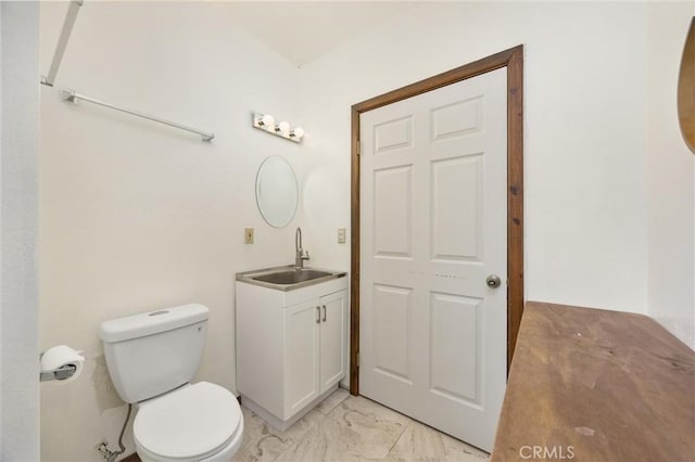 14521 Voltaire Dr, Pine Mountain Club, CA 93222 - bathroom featuring vanity, toilet, and marble finish floors