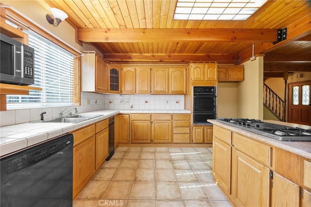14521 Voltaire Dr, Pine Mountain Club, CA 93222 - kitchen featuring black appliances, wood ceiling with exposed beams, a sink, tile counters, and decorative backsplash