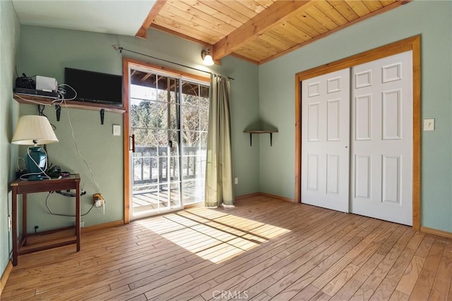 14521 Voltaire Dr, Pine Mountain Club, CA 93222 - entryway featuring hardwood / wood-style floors, wood ceiling with exposed beams, and baseboards