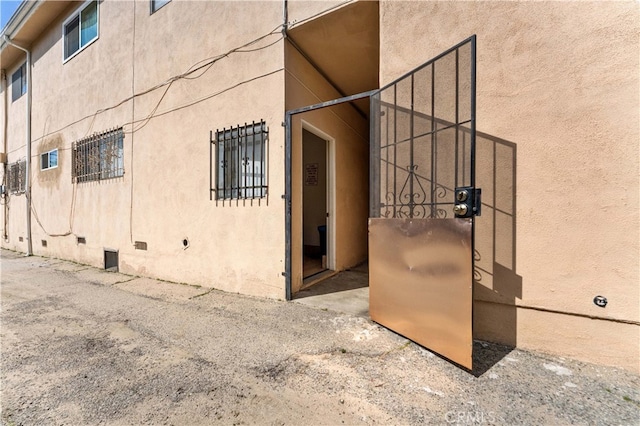 view of property exterior with stucco siding