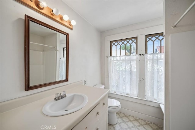 1811 Chorro St, San Luis Obispo, CA 93401 - bathroom with a shower, tile patterned floors, vanity, and toilet