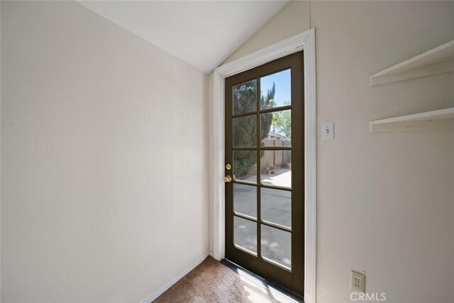 1811 Chorro St, San Luis Obispo, CA 93401 - entryway featuring carpet, baseboards, and vaulted ceiling