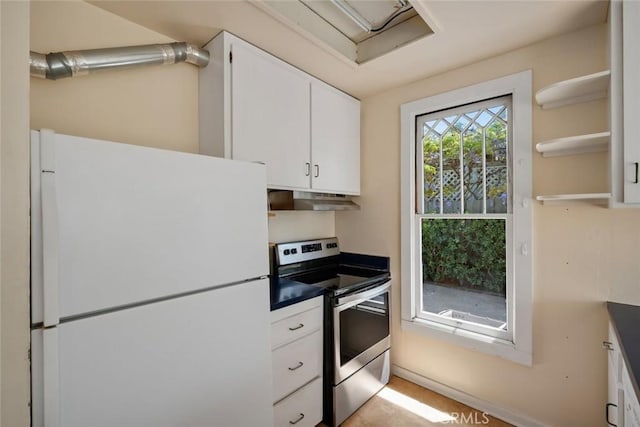 1811 Chorro St, San Luis Obispo, CA 93401 - kitchen featuring under cabinet range hood, electric stove, white cabinetry, and freestanding refrigerator